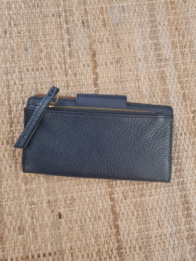 Fossil patterned leather purse