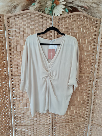 Knot front blouse in cream