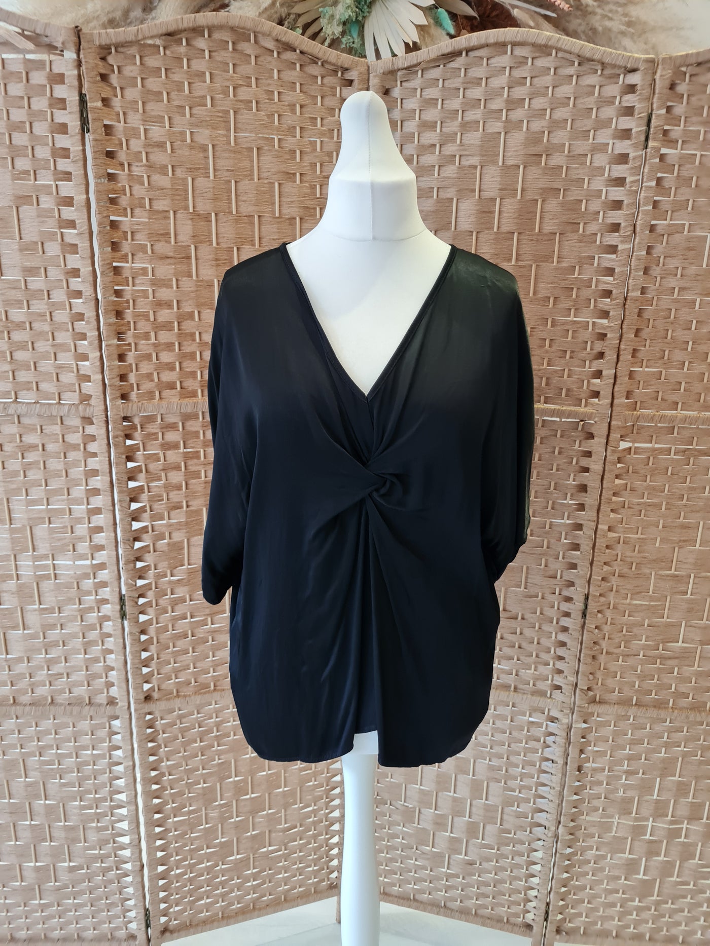 Knot front blouse in black