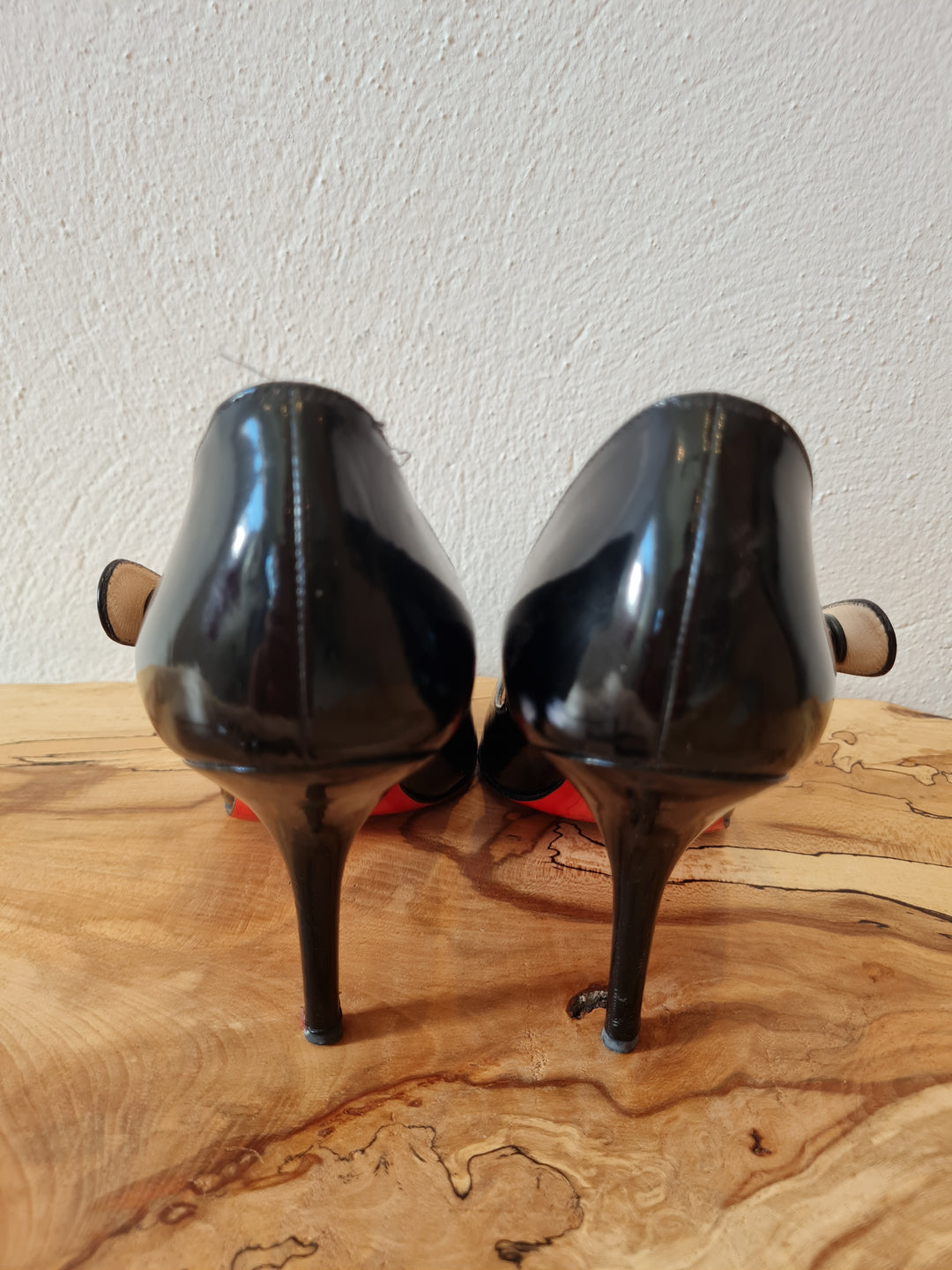 Black high heels with red soles best sale