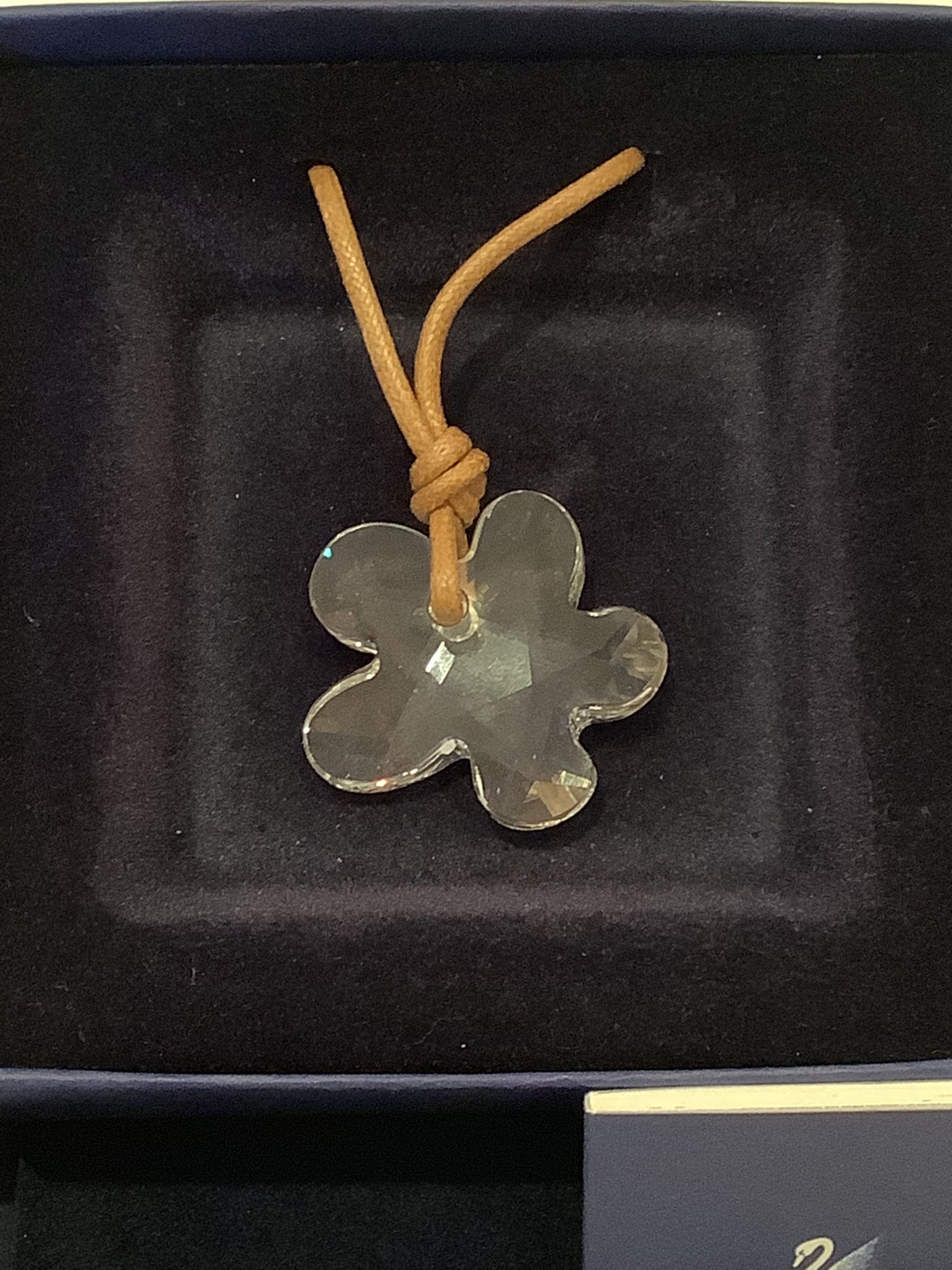 Swarovski crystal flower on tan cord